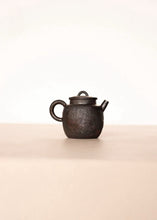 Load image into Gallery viewer, Fire Marks Etched in Clay · Rustic Elegance Tongxin She Tea House presents: Wood-fired Hand-shaped Teapot 120cc
