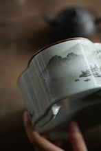 Load image into Gallery viewer, Ink-colored Landscape Copper-top Tea Boat Tongxinshe Teahouse Recommendation A tea session, with mountains and rivers captured on the vessel. 墨彩山水铜面茶船/壶承
