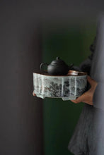 Load image into Gallery viewer, Ink-colored Landscape Copper-top Tea Boat Tongxinshe Teahouse Recommendation A tea session, with mountains and rivers captured on the vessel. 墨彩山水铜面茶船/壶承
