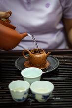 Load image into Gallery viewer, Tasting in Tongxin She Teahouse: Encountering the Timeless Secrets of the 1940 Antique Pu&#39;er Tea
