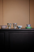Load image into Gallery viewer, Imitation Kangxi Period Five-Colored Porcelain Cup Pair: The Romance of the Western Chamber Scenes
