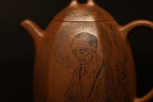Load image into Gallery viewer, A Treasured Purple Clay Vessel, A Wonderful Realm of Zen Tea——Appreciation of the Hexagonal Qinquan Teapot with Engraving of Patriarch Bodhidharma in Tongxinshe Teahouse Collection
