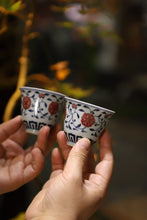 Load image into Gallery viewer, Elegance in Porcelain | Jingdezhen Underglaze Red Lotus Scroll Bell Cup, An Invitation to Oriental Tea Ceremony
