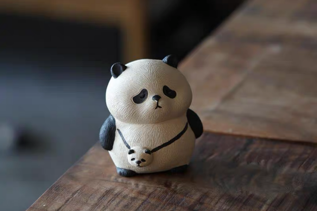 Panda/Purple Sand Tea Pets are cute.